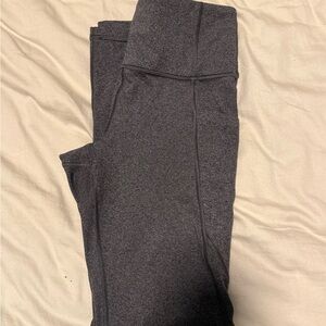 Athleta Stash Pocket Salutation Tight Leggings